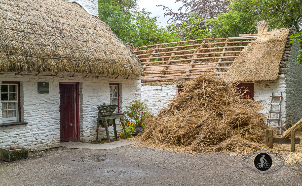 Thatched roof cottage with straw off