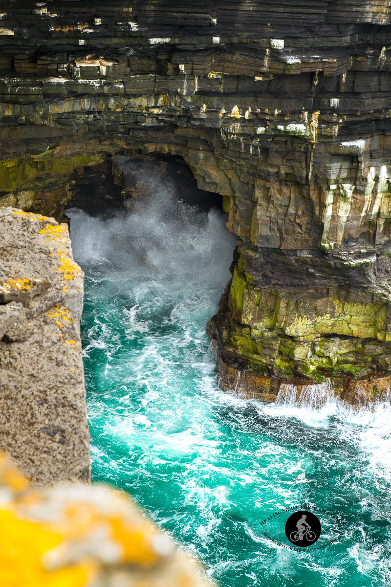 Water crashing into cave at Dun Briste - County Mayo - closer