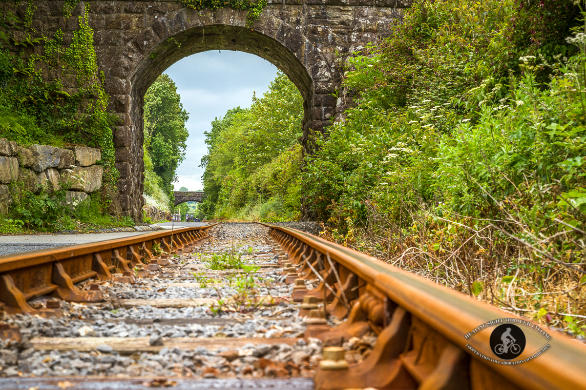 Stone arch over train tracks and Waterford Greenway - 2